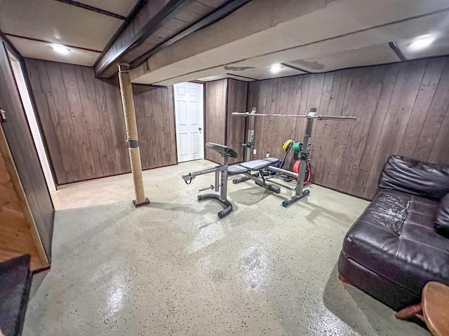 exercise room with wooden walls