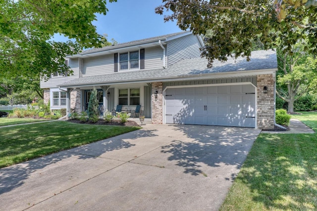 front facade with a garage, a porch, and a front lawn