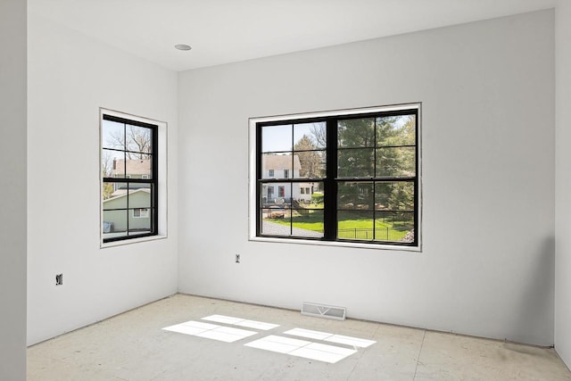 396 Strauss Ave, Green Lake, WI 54941 - empty room featuring plenty of natural light and visible vents