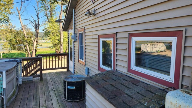 wooden deck with central AC unit