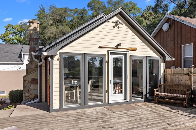 exterior space featuring a wooden deck