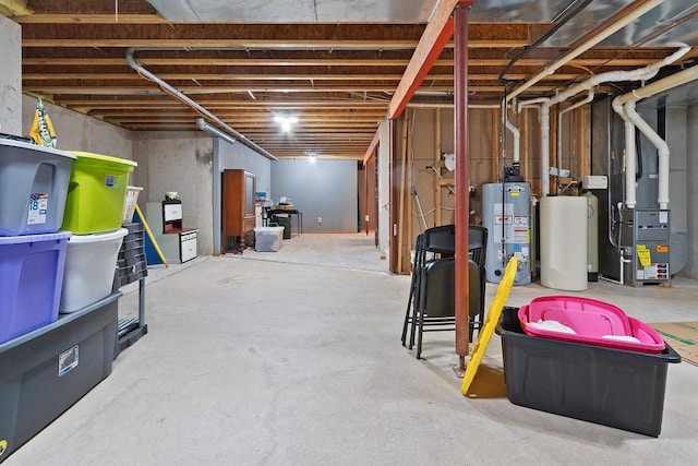 basement featuring water heater and heating unit