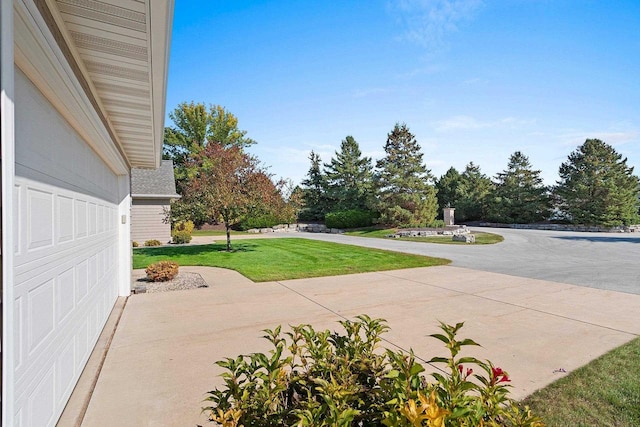 view of patio with a garage