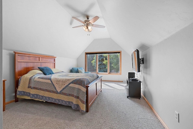 bedroom featuring ceiling fan, lofted ceiling, and carpet flooring