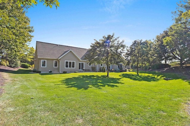 view of front of home featuring a front lawn