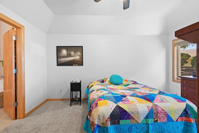 bedroom with light carpet, lofted ceiling, and ceiling fan