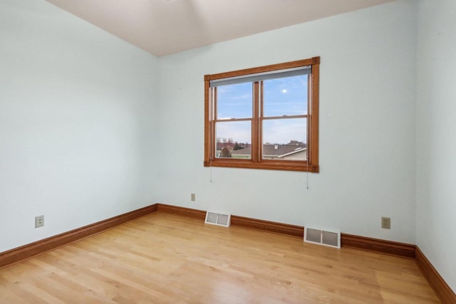 unfurnished room featuring light hardwood / wood-style flooring