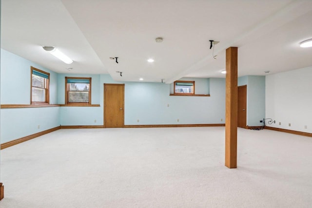 basement with light colored carpet