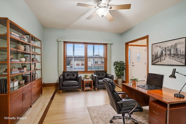 office area with ceiling fan and light hardwood / wood-style flooring