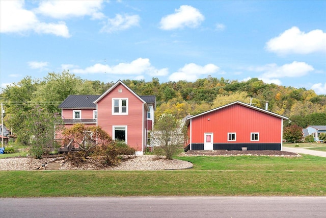 view of property exterior featuring a yard