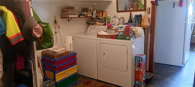 laundry area with washer and clothes dryer