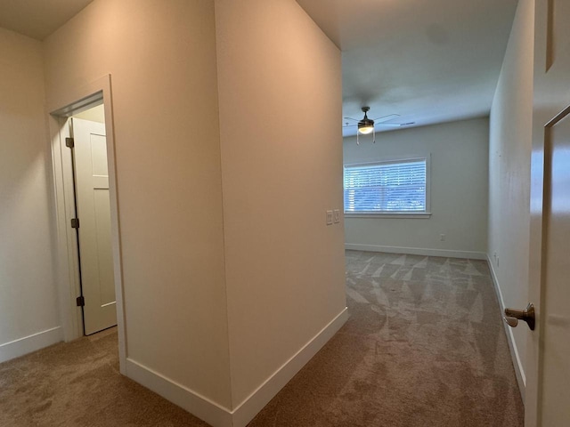 corridor featuring carpet flooring