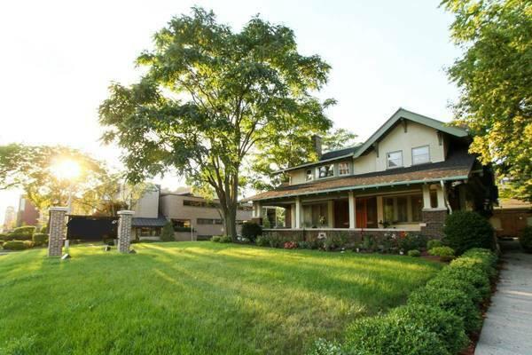 rear view of house with a yard