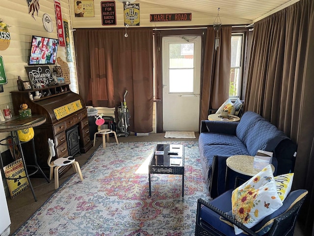 living room with vaulted ceiling