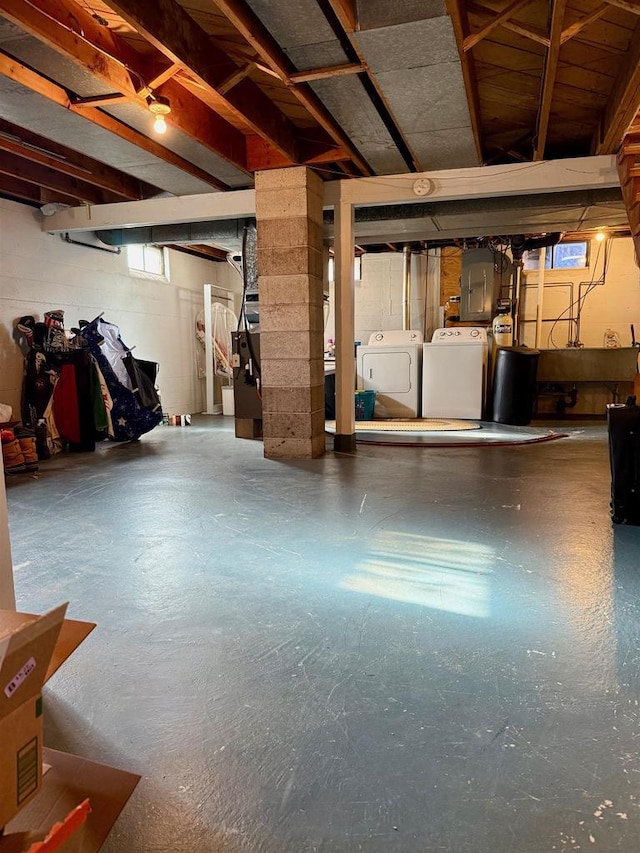 basement featuring washing machine and dryer