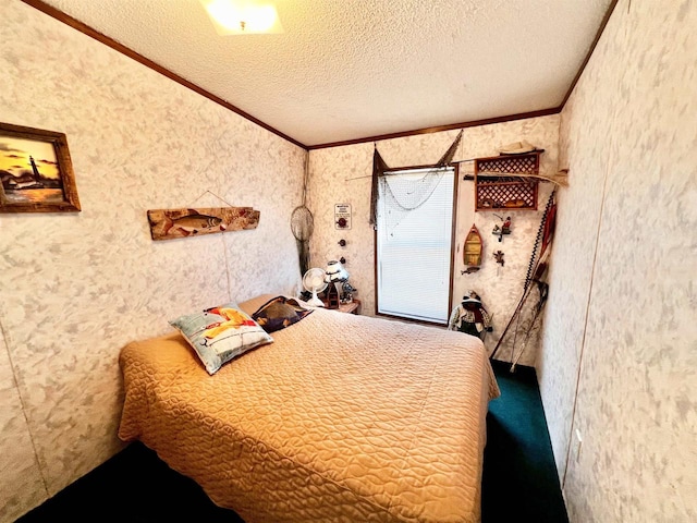 bedroom featuring ornamental molding and a textured ceiling