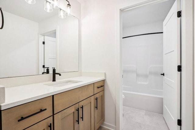 full bathroom featuring vanity, bathtub / shower combination, and toilet