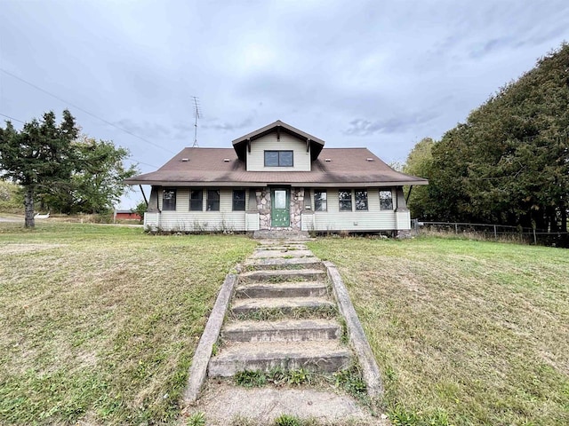 view of front facade with a front yard