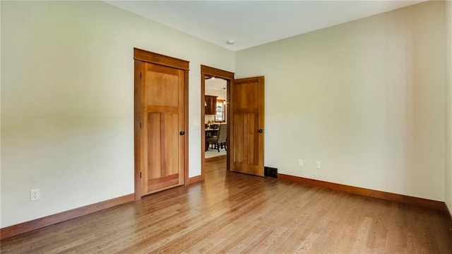 empty room featuring light hardwood / wood-style flooring