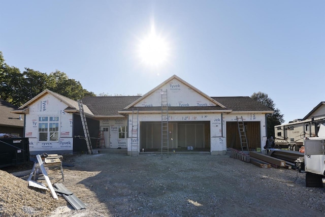 property under construction with a garage