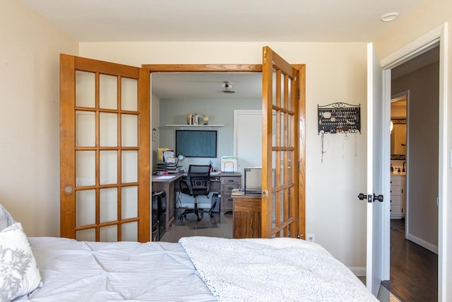 bedroom with hardwood / wood-style floors