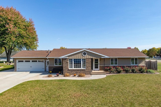 ranch-style home featuring a front lawn and a garage