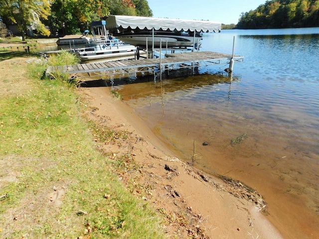 view of dock with a water view