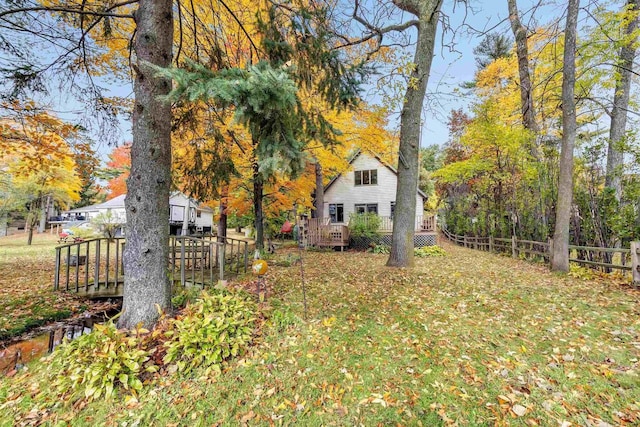 view of yard with a wooden deck