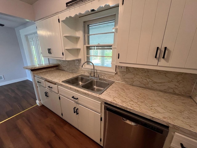 kitchen featuring sink, dishwasher, white cabinetry, backsplash, and dark hardwood / wood-style flooring