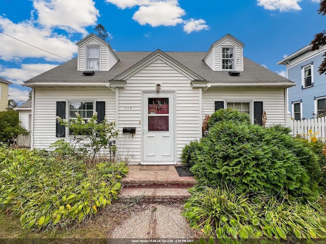 view of new england style home