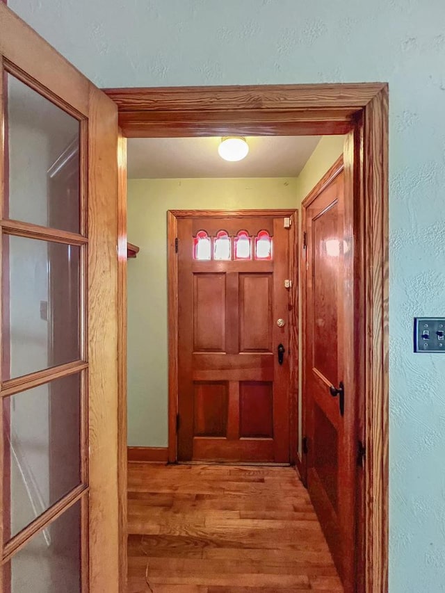 entryway with light hardwood / wood-style flooring