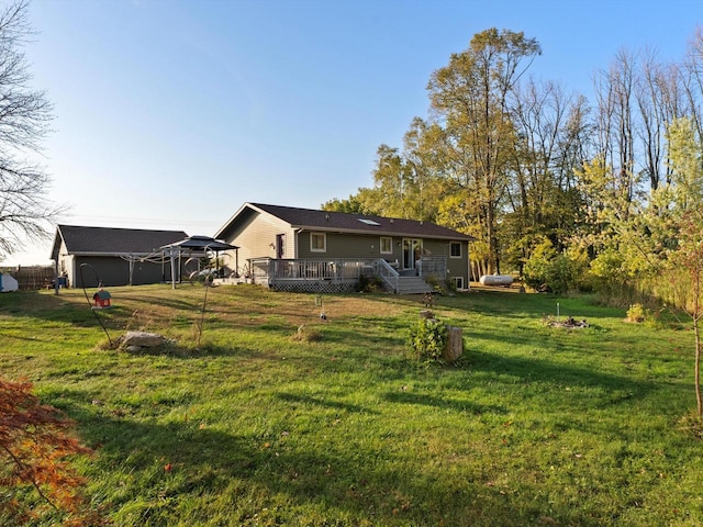 exterior space featuring a wooden deck and a garage