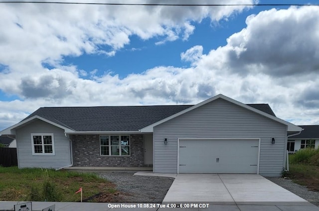 single story home featuring a garage