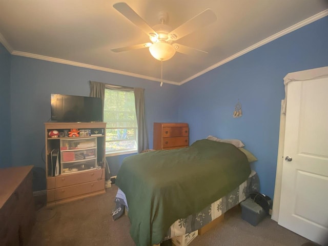 carpeted bedroom featuring ceiling fan and crown molding