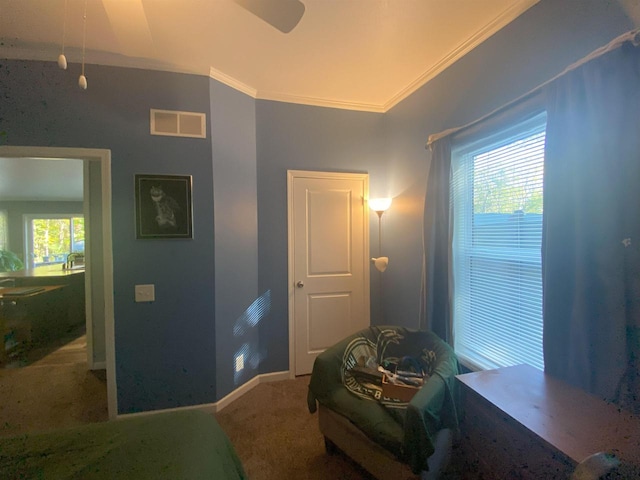 carpeted bedroom with crown molding