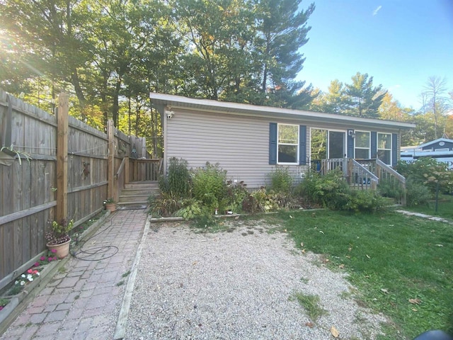 view of front of home with a front yard