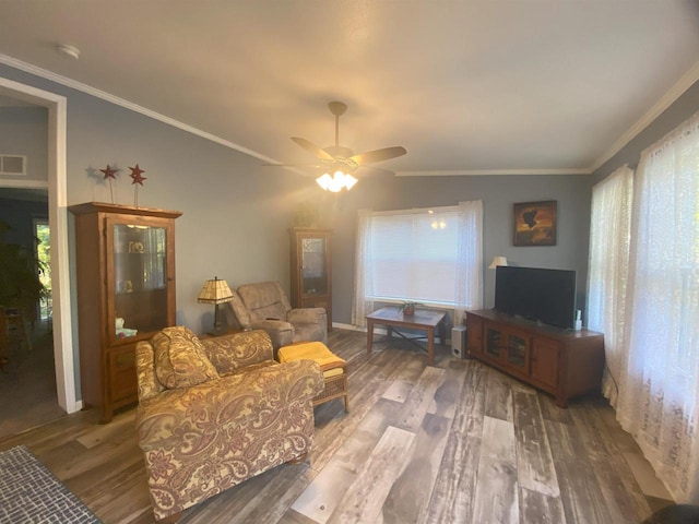 living room featuring ceiling fan, crown molding, and hardwood / wood-style floors