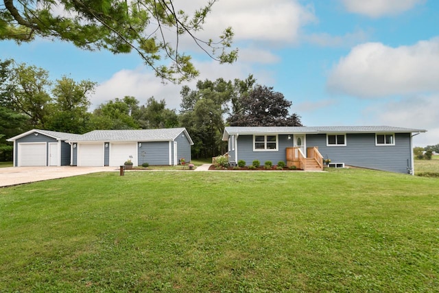 ranch-style home with a garage and a front lawn