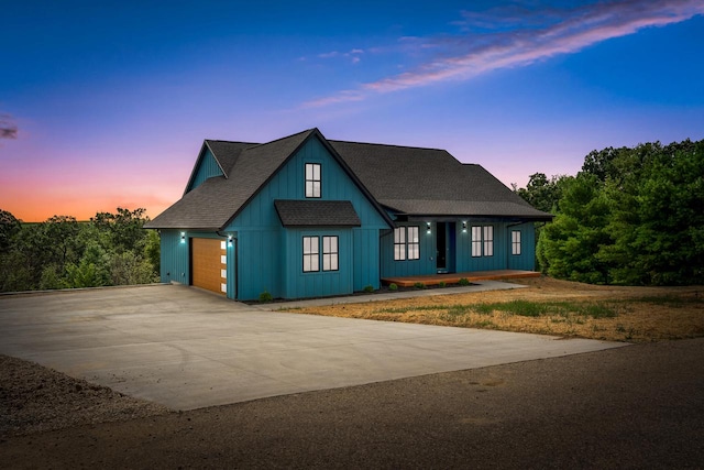 view of front of property with a garage