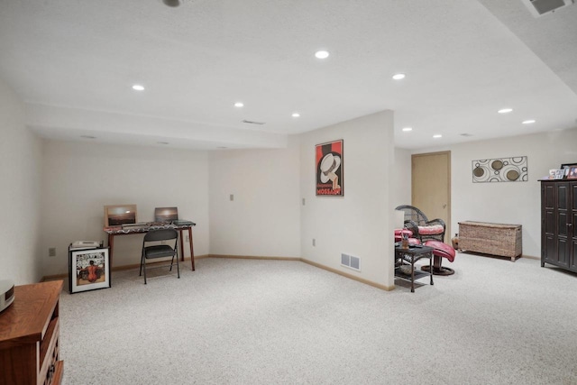 sitting room with light carpet