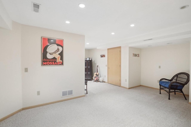 sitting room with light carpet