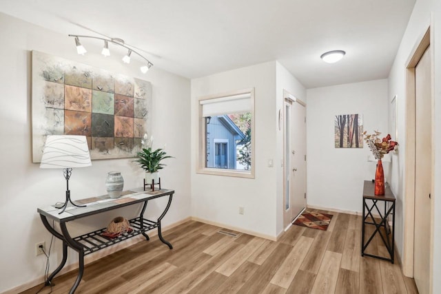 entrance foyer featuring light hardwood / wood-style floors