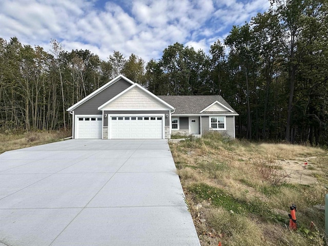 ranch-style home with a garage