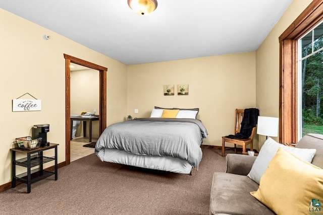 bedroom with light colored carpet