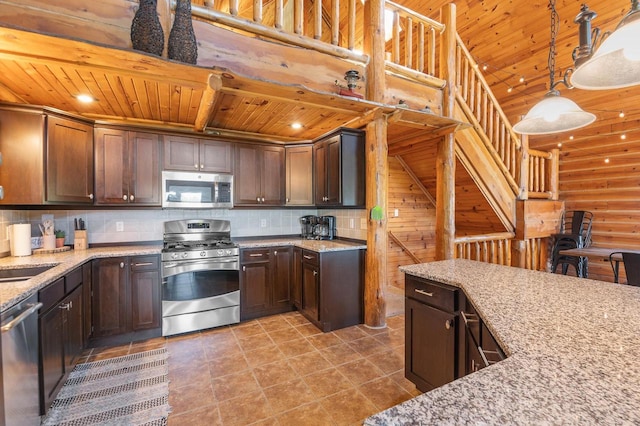 kitchen with appliances with stainless steel finishes, wooden ceiling, light stone countertops, and decorative light fixtures