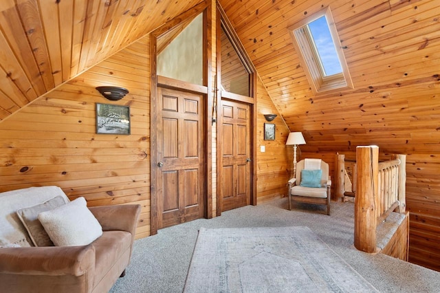 living area with lofted ceiling with skylight, wooden walls, wood ceiling, and carpet