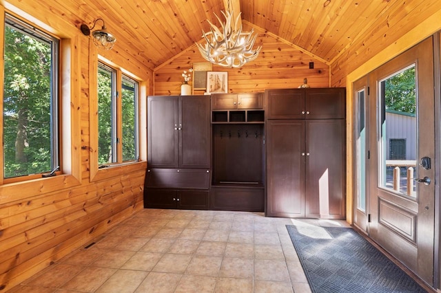 mudroom featuring wooden ceiling, lofted ceiling, and plenty of natural light