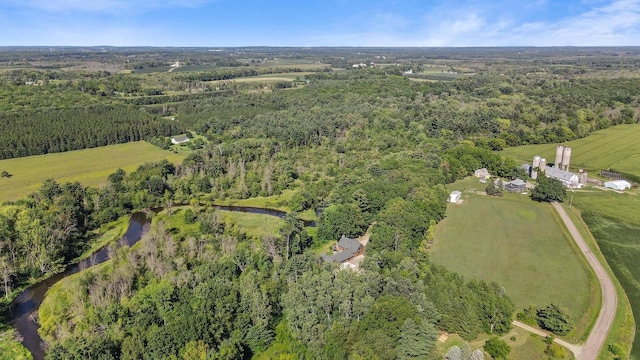 birds eye view of property featuring a rural view