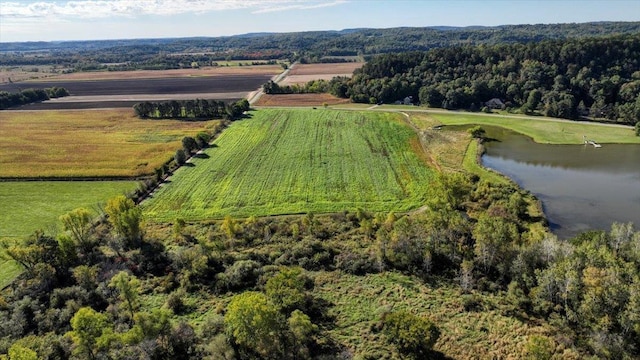 bird's eye view featuring a water view and a rural view