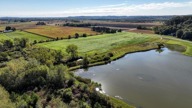 bird's eye view featuring a water view and a rural view